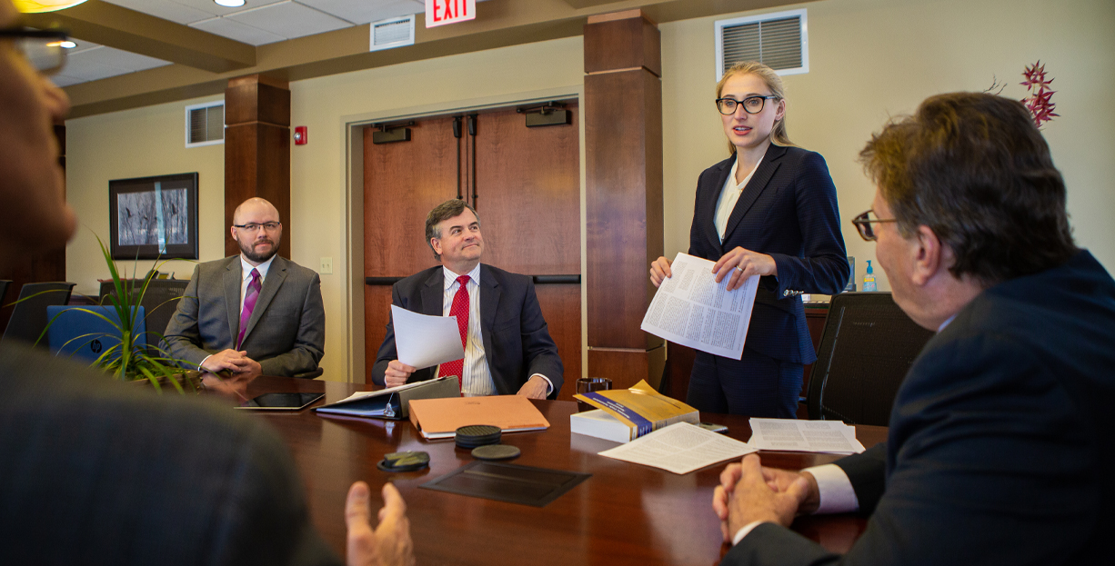 BKBH Attorneys around conference table